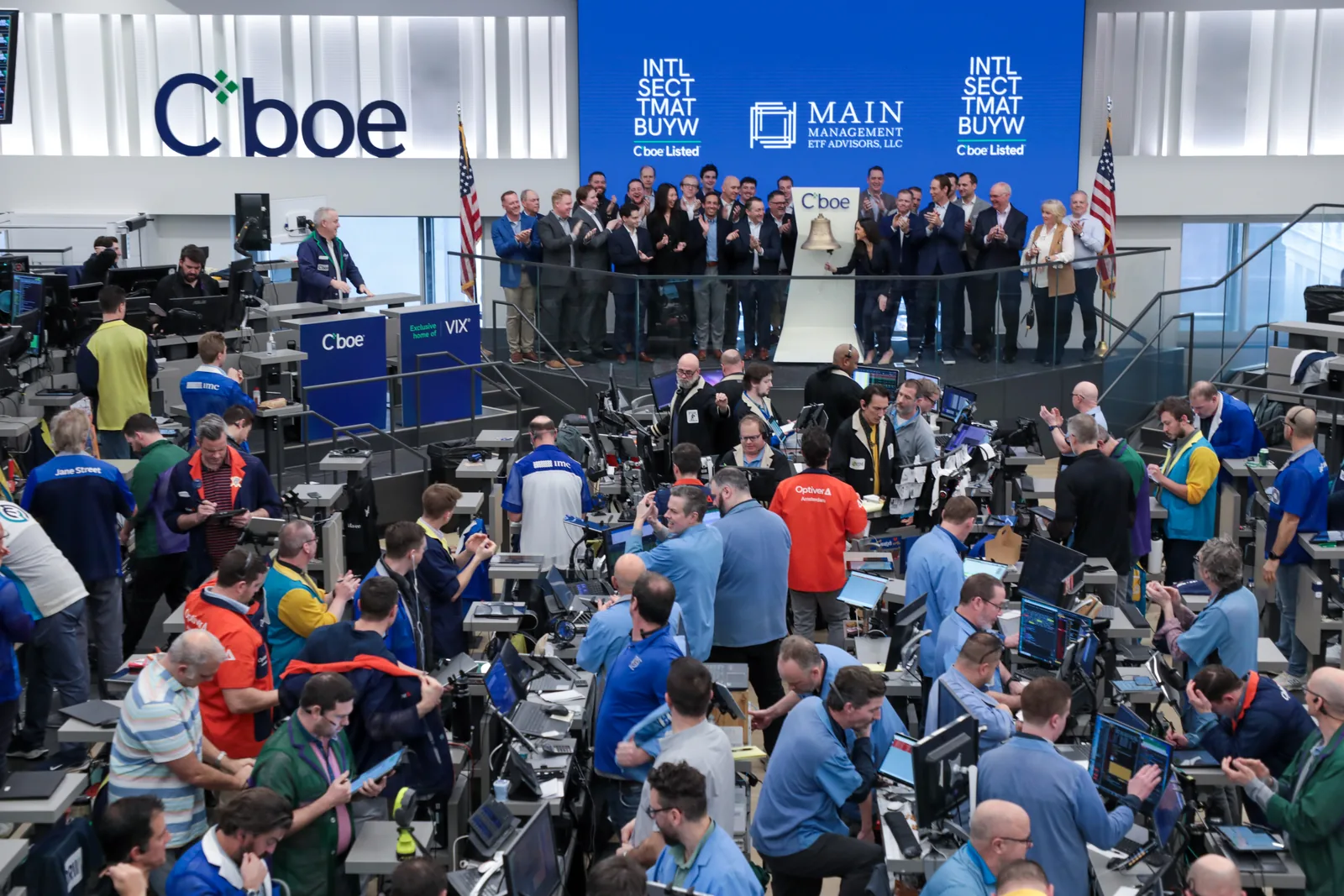 Main Management ringing the opening bell above the Cboe trading floor in Chicago