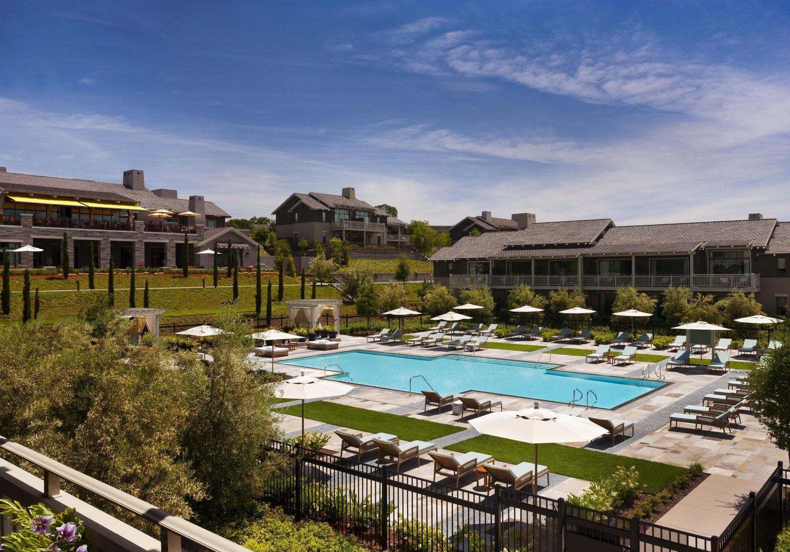 Pool terrace and lodges at Rosewood Sand Hill